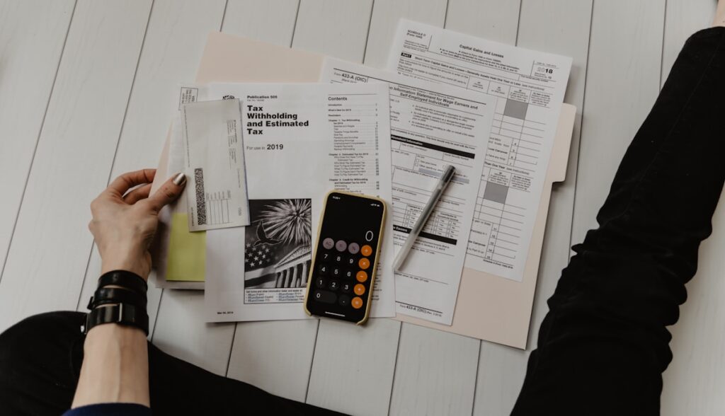 Tax forms and calculator representing property tax review